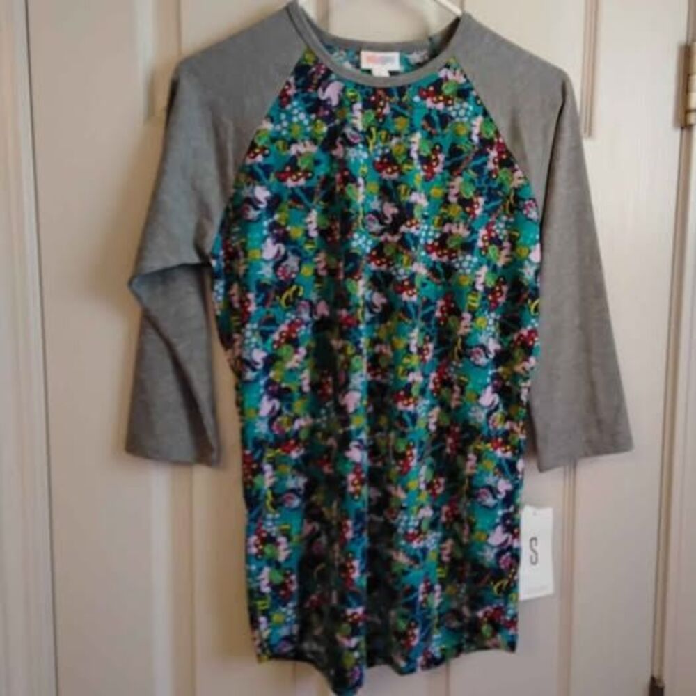 LuLaRoe Disney print Randy shirt, Size Small see pics for measurements. (J-86)